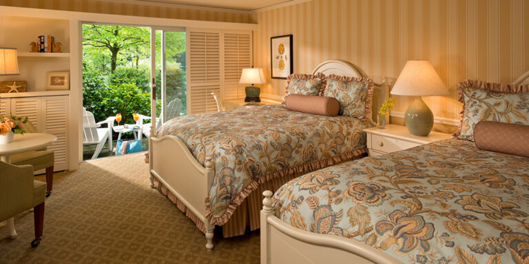 Garden view suite with two double beds on Cape Cod