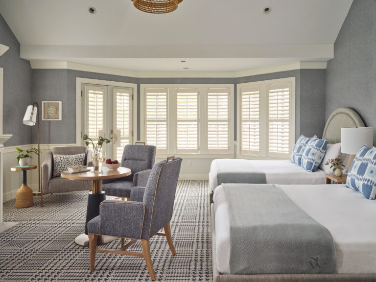 Signature Double Queen with bay windows and tailored style.