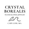 Logo for Crystal Borealis Handcrafted Jewelry, featuring stylized waves, text stating "Cape Cod, MA", and a nod to the area’s Annual Event and Fireworks.
