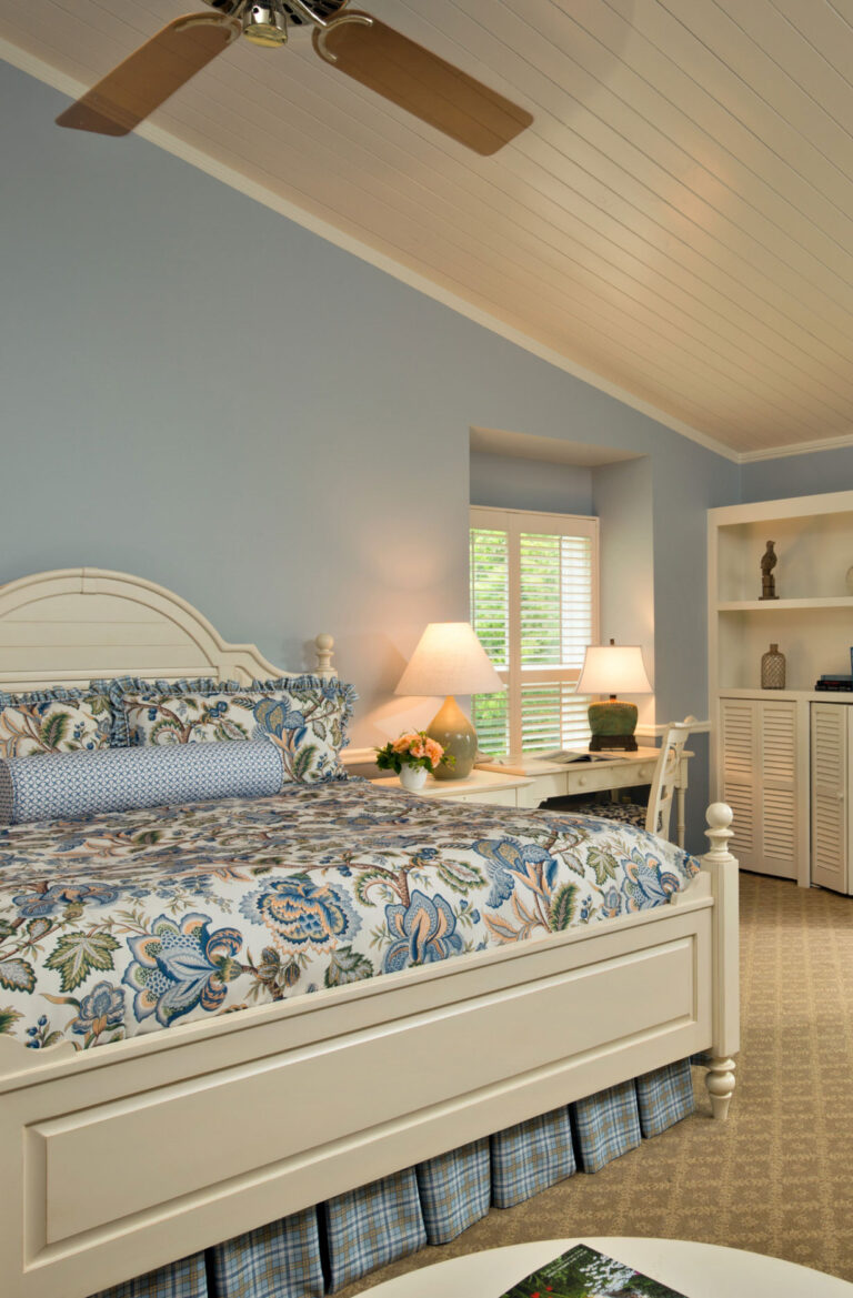 Blue bed in a hotel villa room on Cape Cod.