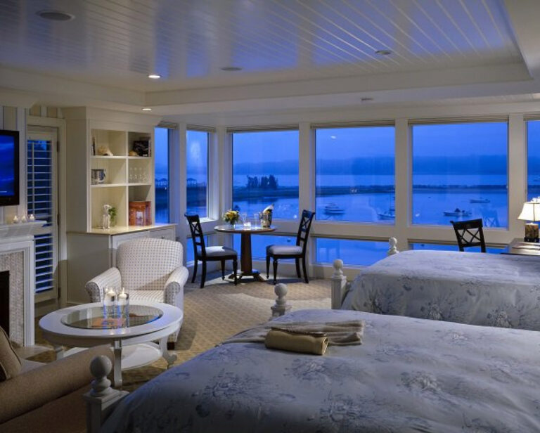 Hotel room looking out onto ocean.