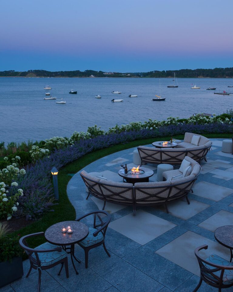 Patio with fire looking out onto a Cape Cod ocean.