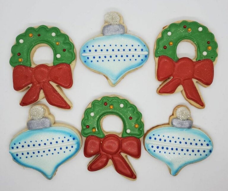 Holiday cookies decorated as wreaths and ornaments.